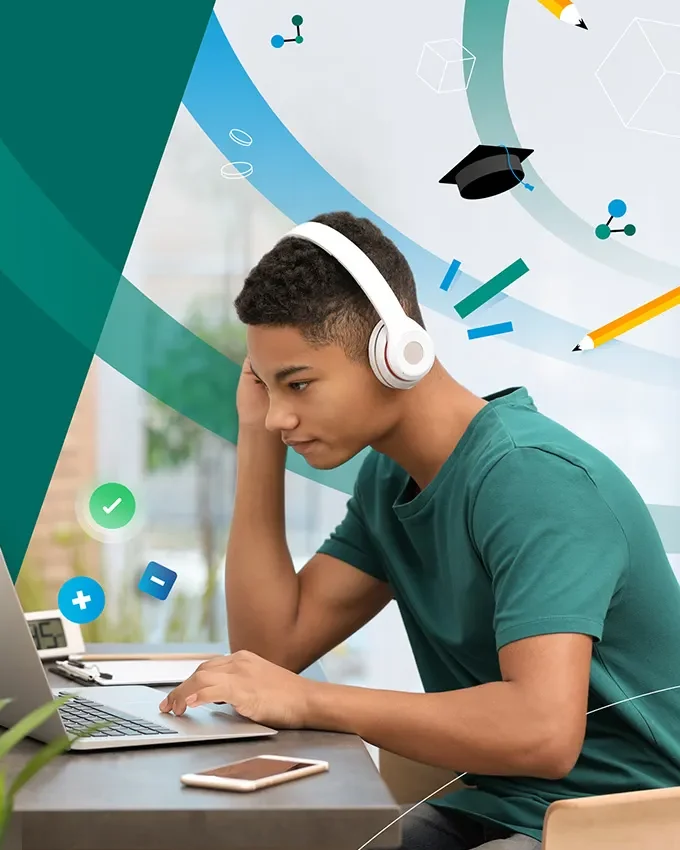 A learner wearing headphones working on a laptop